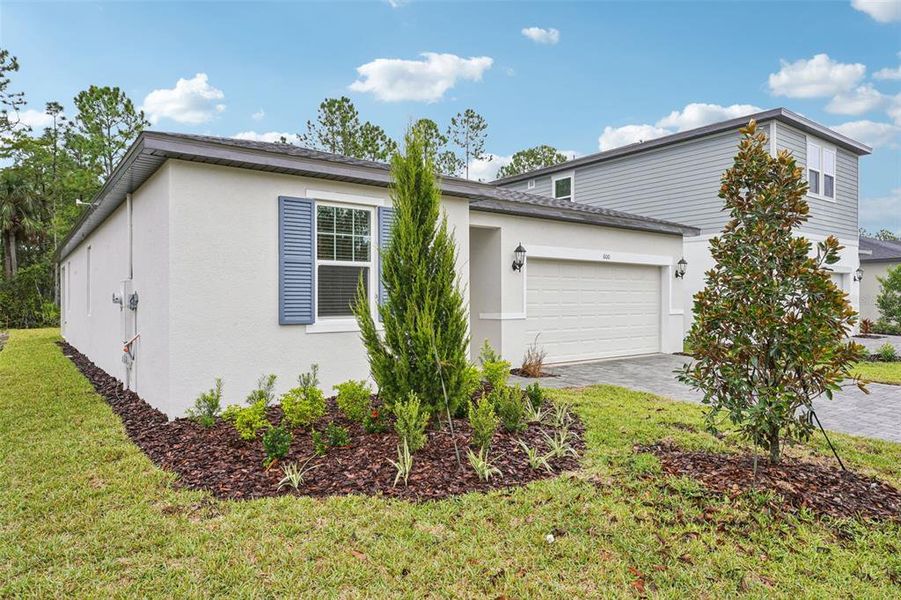 Exterior details and patio area of a home in Ridgehaven - Signature Series, Ormond Beach (Image 29).