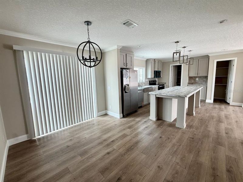 Furnished interior view inside a new home in , Okeechobee (Image 8).