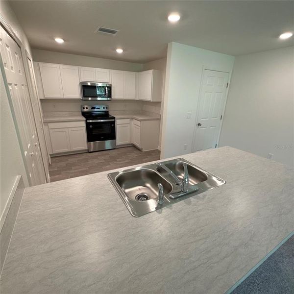 Furnished interior view inside a new home in Palm Coast: Value Collection, Palm Coast (Image 5).