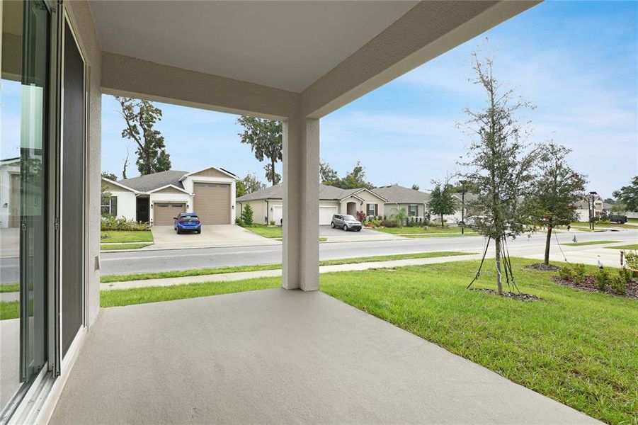 Exterior details and patio area of a home in Seasons at Grandview Gardens, Deland (Image 3).