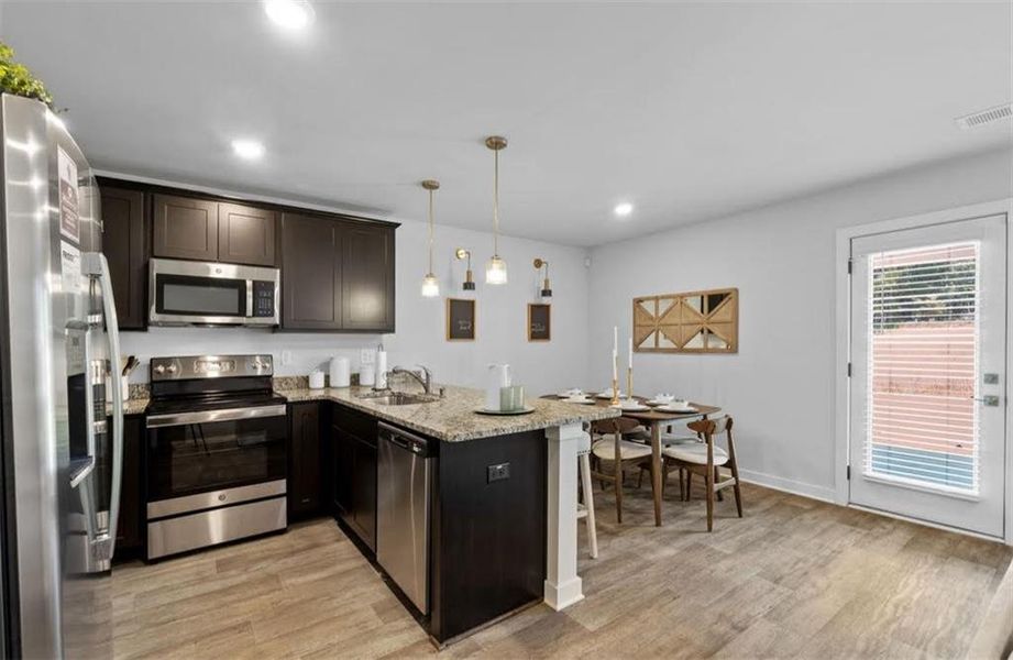 Furnished interior view inside a new home in Campground Crossing, Stockbridge (Image 12).