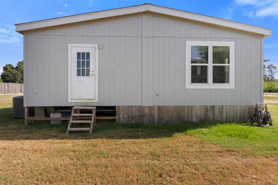 Exterior details and patio area of a home in , Conroe (Image 21).
