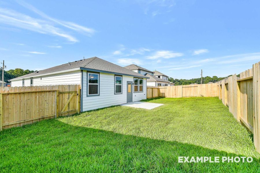 Exterior details and patio area of a home in Windmill Estates, Magnolia (Image 2).