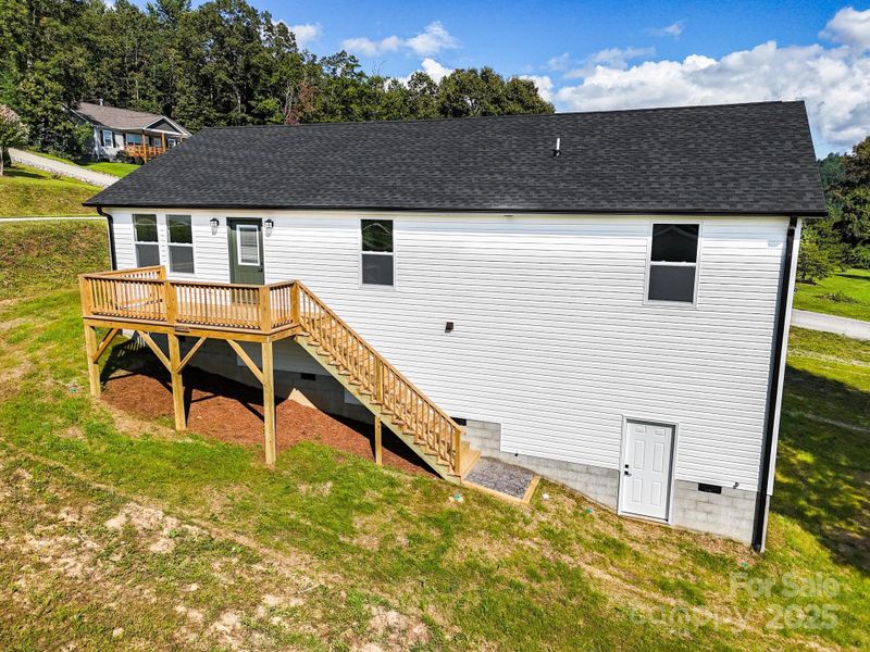 Front exterior of a new home in , Hendersonville, NC, highlighting curb appeal (Image 19).