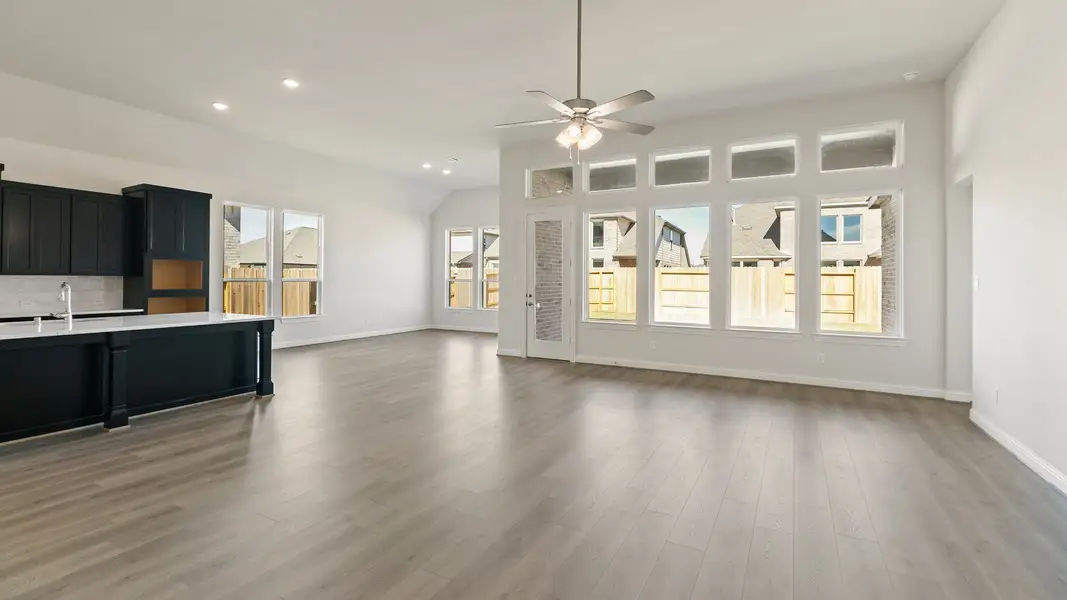 Representative furnished interior of a home built from the Yale by DRB Homes in Creekhaven, Iowa Colony (Image 6).