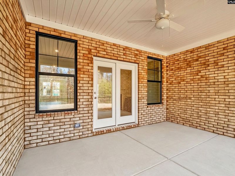 Exterior details and patio area of a home in Collins Cove, Chapin (Image 27).