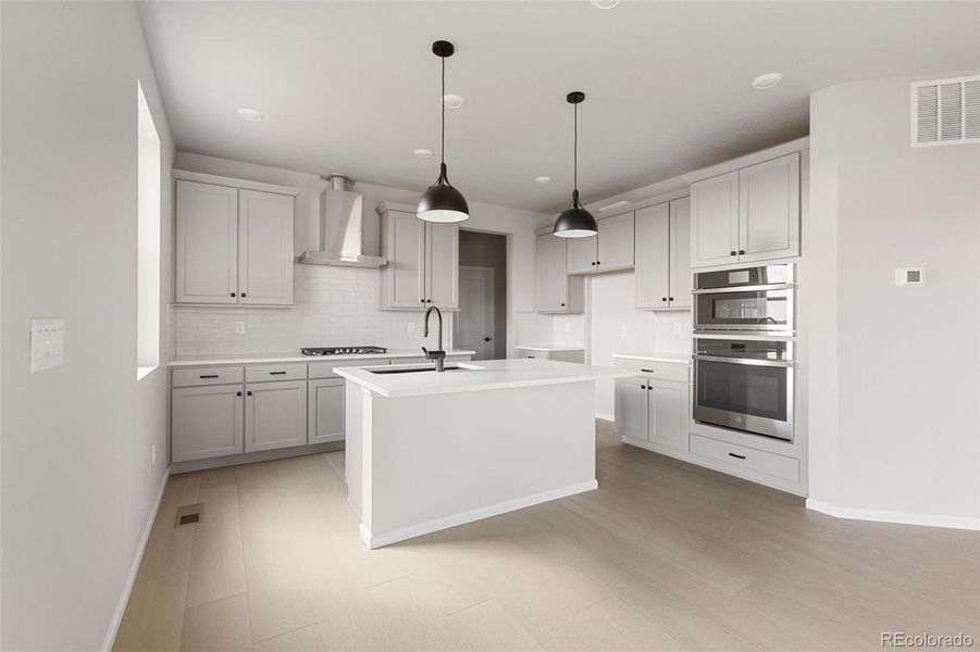 Furnished interior view inside a new home in The Legacy Collection at Talon Pointe, Thornton (Image 12).