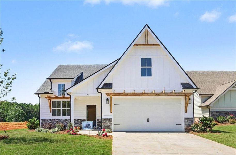 Front exterior of a new home in , Winston, GA, highlighting curb appeal (Image 18).