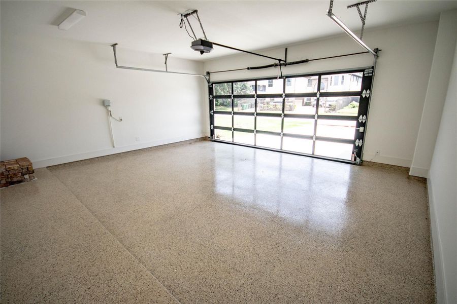 Gorgeous Garage that has wow factor and sprinkler console and epoxy flooring Gorgeous Garage that has wow factor and sprinkler console and epoxy flooring