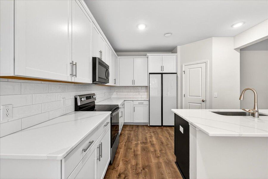 Furnished interior view inside a new home in Jasmine Point at Lakes of Cane Bay, Summerville (Image 6).