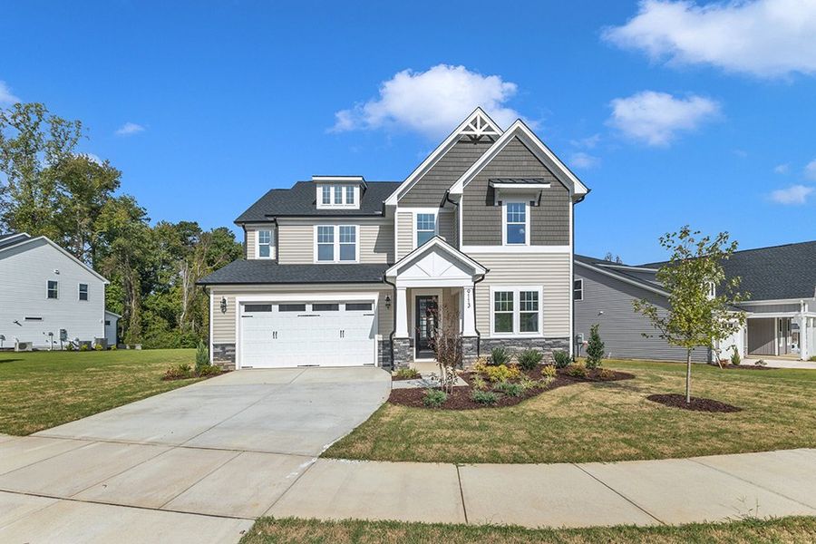 Representative exterior photo of a completed home built from the The Hampton by RobuckHomes in Kennebec Crossing, Angier, NC (Image 37). Representative exterior photo of a completed home built from the The Hampton by RobuckHomes in Kennebec Crossing, Angier, NC (Image 37).
