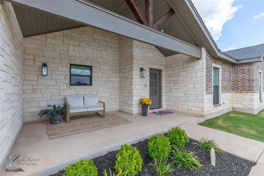 Property entrance with stone siding Property entrance with stone siding