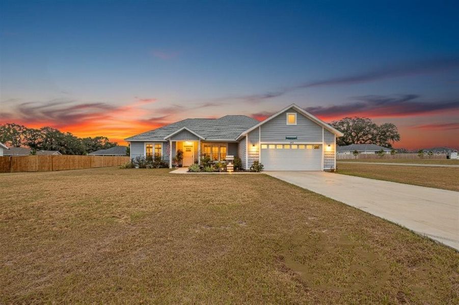 Front exterior of a new home in , Trenton, FL, highlighting curb appeal (Image 1).