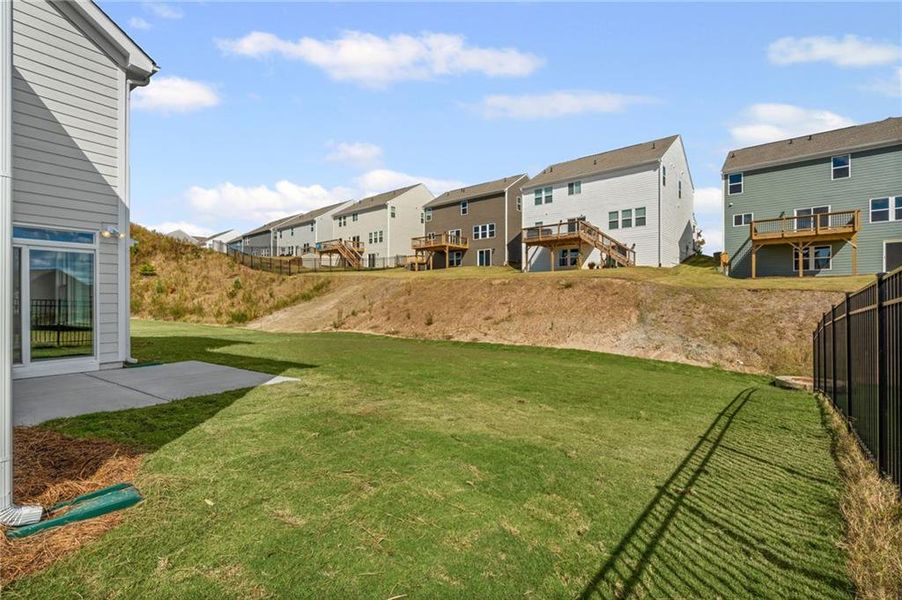 Exterior details and patio area of a home in Twin Lakes, Hoschton (Image 3).