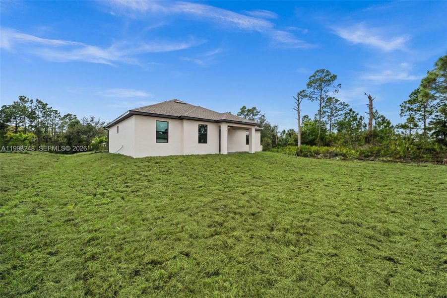 Exterior details and patio area of a home in , Lehigh Acres (Image 19).