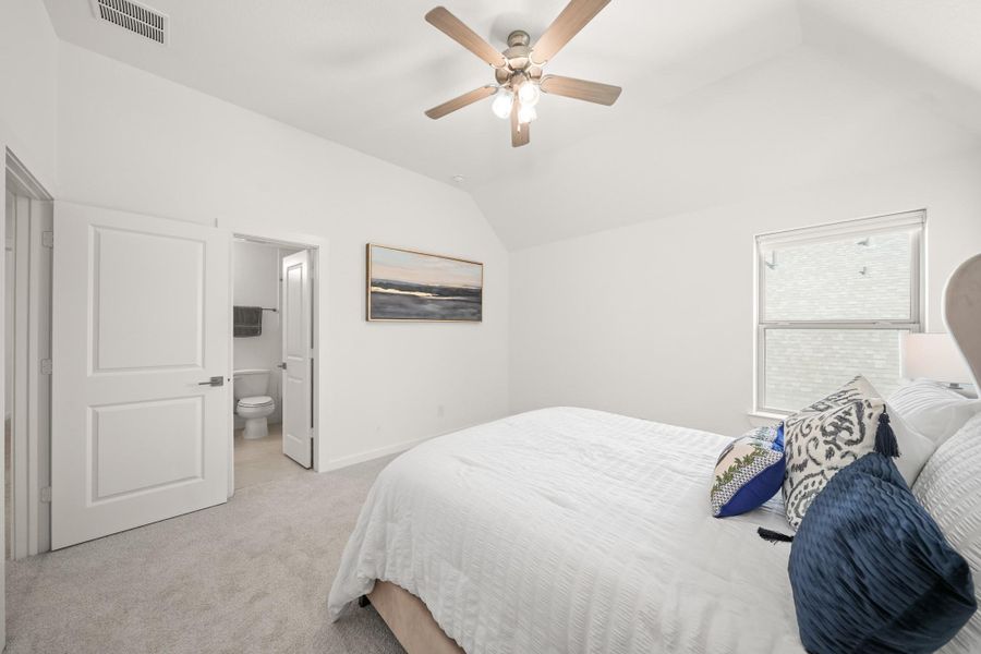 This room has a spacious feel and a functional layout with access to an ensuite bathroom.