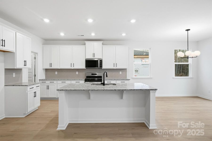 Furnished interior view inside a new home in Wellington Pointe Executive, Monroe (Image 12).