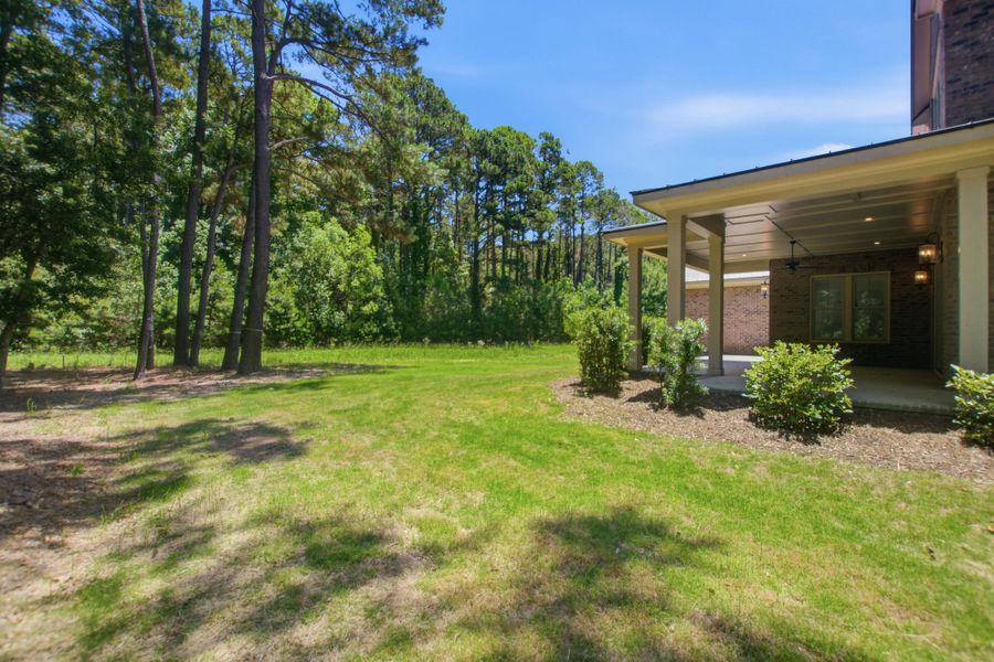 Exterior details and patio area of a home in , Johns Island (Image 3).