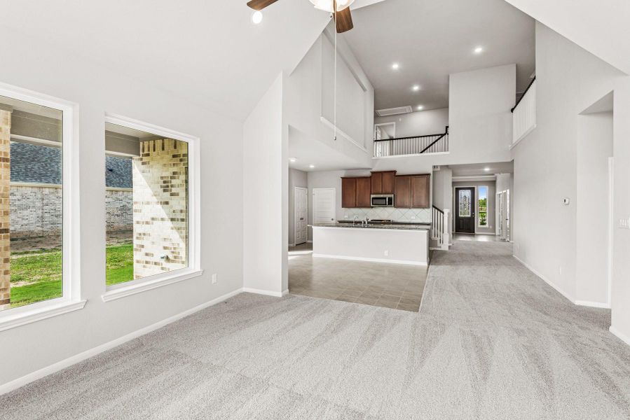 Great room with high ceilings (*Photo not of actual home and used for illustration purposes only.)
