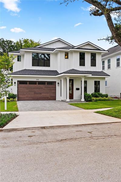 Front exterior of a new home in , Orlando, FL, highlighting curb appeal (Image 1). Front exterior of a new home in , Orlando, FL, highlighting curb appeal (Image 1).