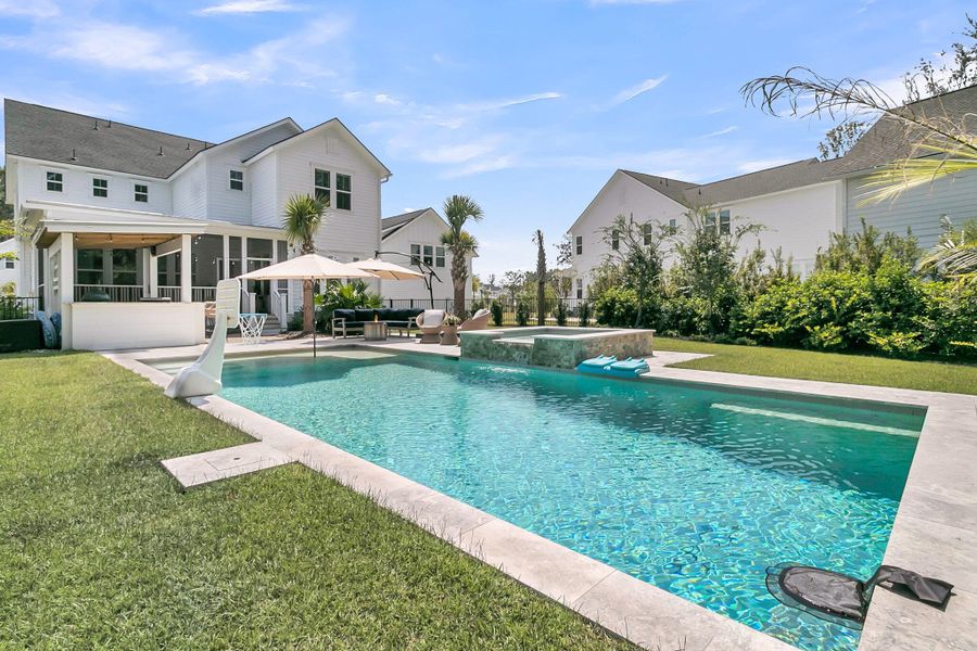 Front exterior of a new home in Carolina Park: Riverside, Mount Pleasant, SC, highlighting curb appeal (Image 25). Front exterior of a new home in Carolina Park: Riverside, Mount Pleasant, SC, highlighting curb appeal (Image 25).