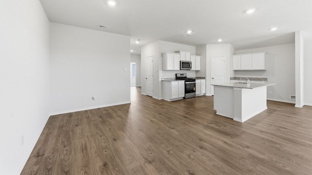 Representative unfurnished interior of a home built from the Learjet by D.R. Horton in Windrose, Pilot Point (Image 8).