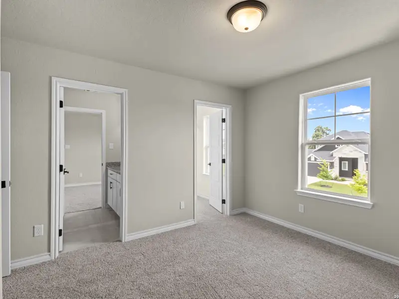 Spacious, unfurnished interior of a new home in The Reserve at Potranco Oaks, Castroville (Image 42).