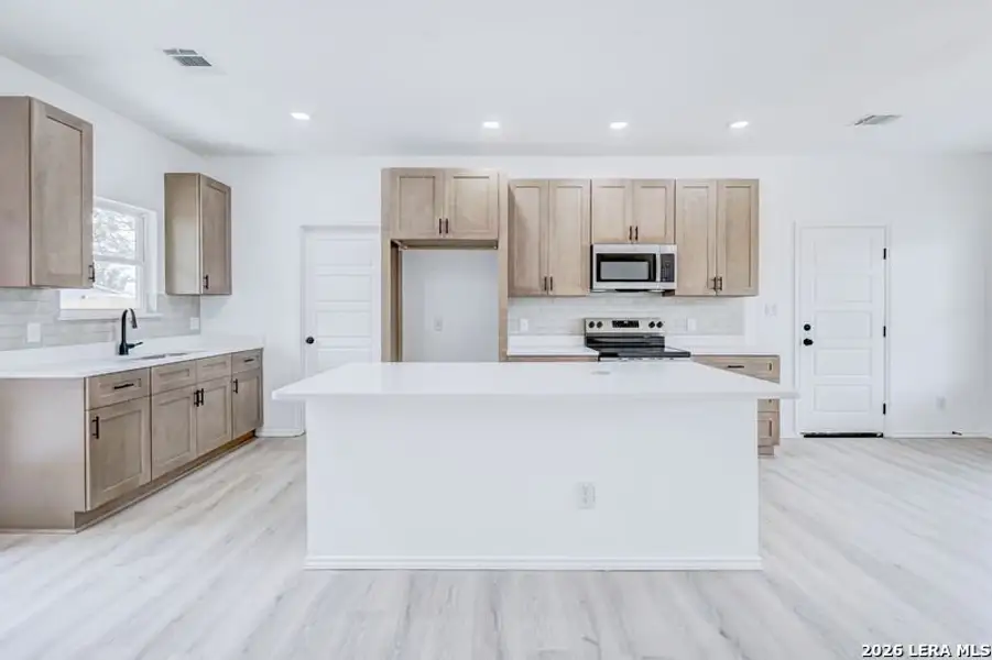 Furnished interior view inside a new home in , San Antonio (Image 4).