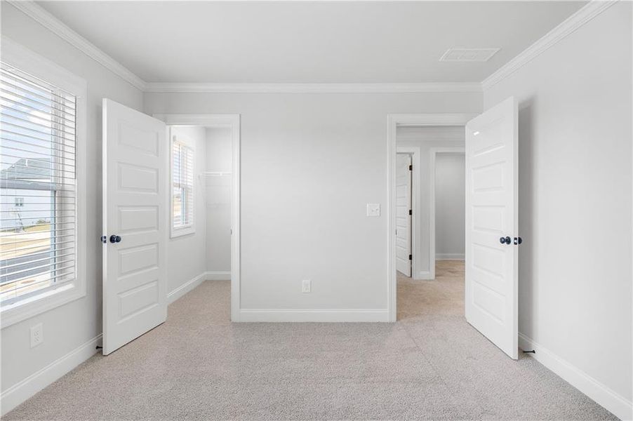 Spacious, unfurnished interior of a new home in Calgary Downs, Winder (Image 34).