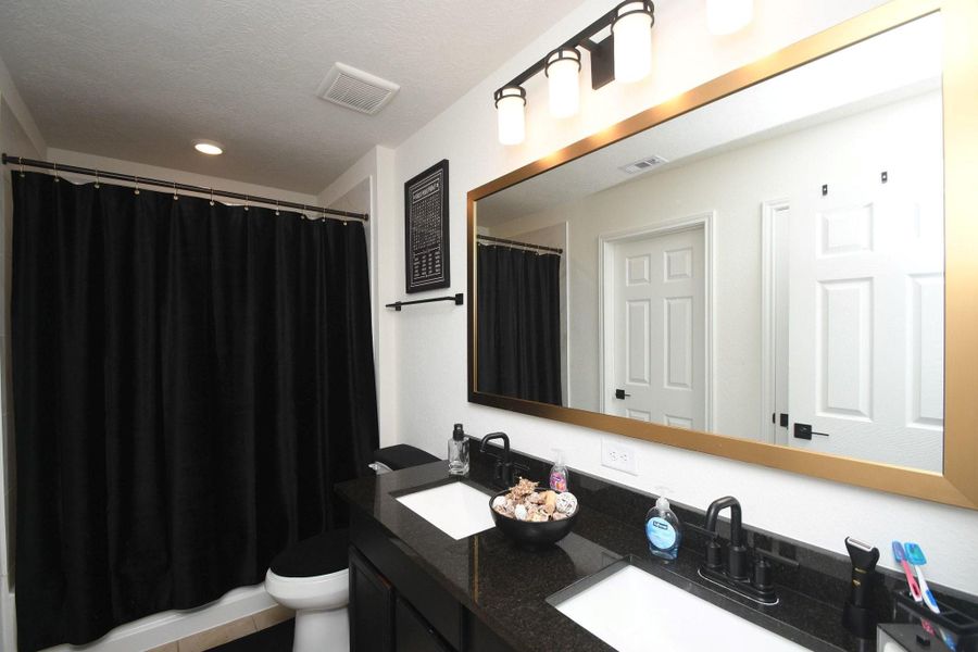 Furnished interior view inside a new home in , Katy (Image 18).
