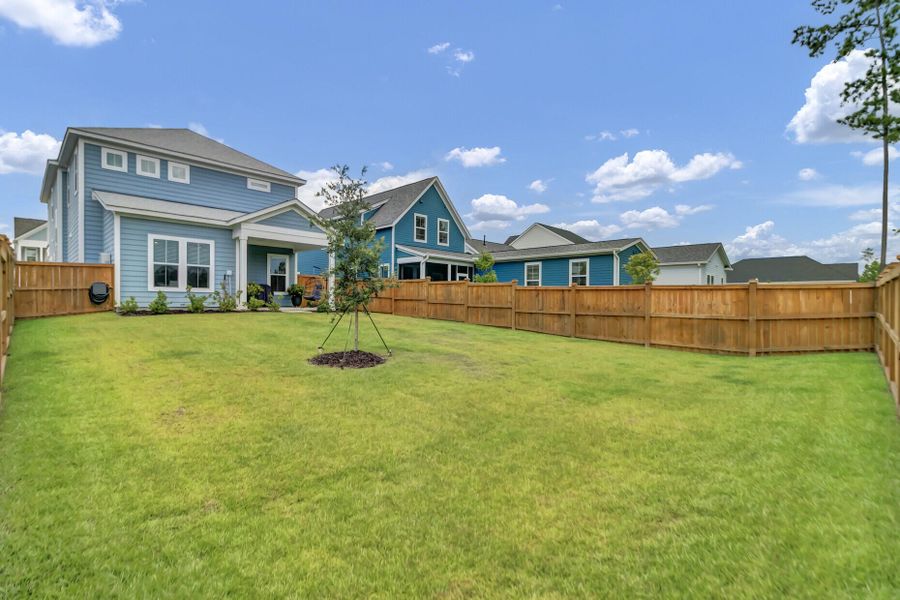 Exterior details and patio area of a home in Midtown at Nexton, Summerville (Image 3).
