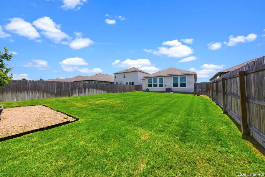 Exterior details and patio area of a home in Briarwood Oaks, San Antonio (Image 4).