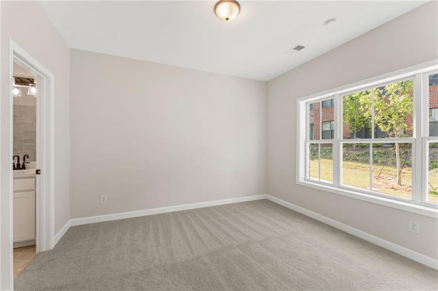 Spacious, unfurnished interior of a new home in Townes at South Main, Kennesaw (Image 17).