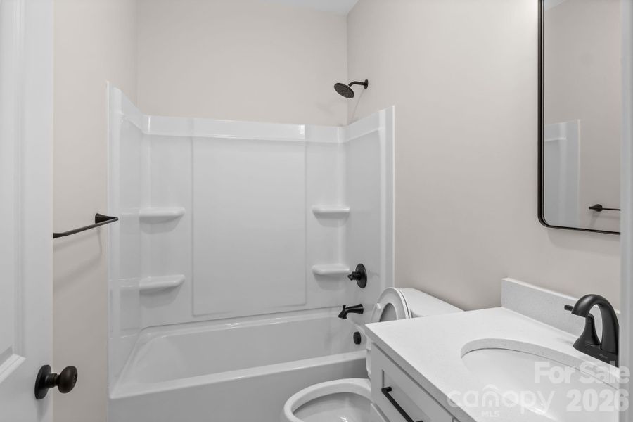 Black fixtures in bathroom