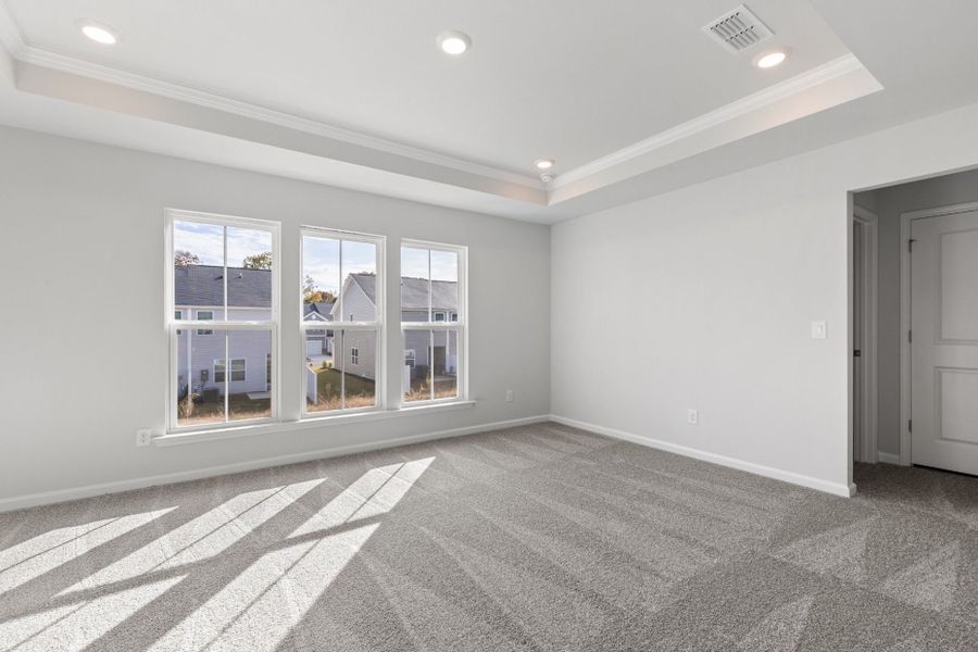 Spacious, unfurnished interior of a new home in Poets Walk, Whitsett (Image 24).