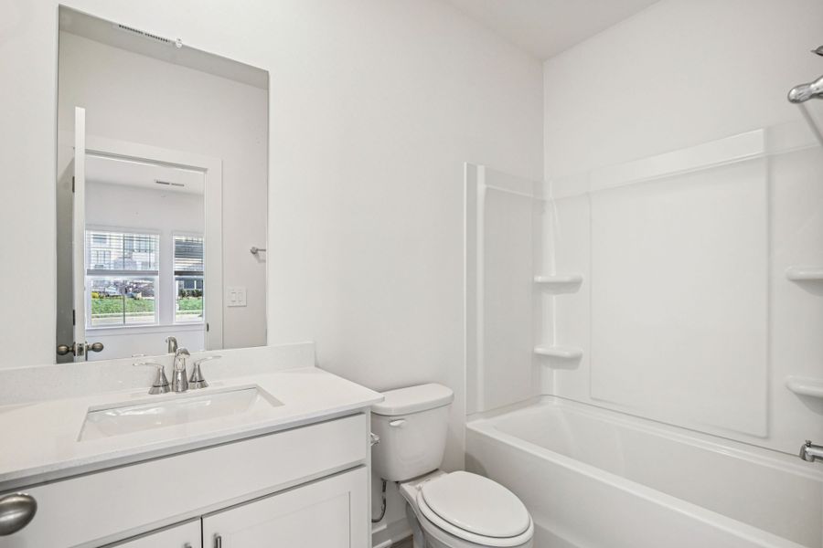 Furnished interior view inside a new home in Greystone - Highland Townhomes, Smyrna (Image 10).