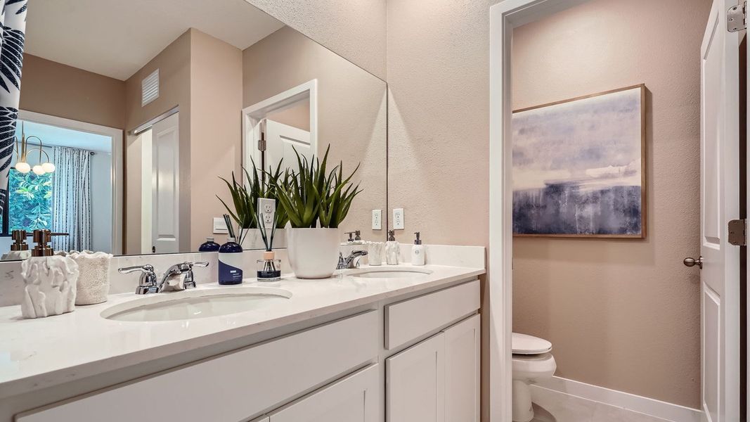 Representative furnished interior of a home built from the Topaz by D.R. Horton in Ashwood Cove, Lake Worth (Image 22).