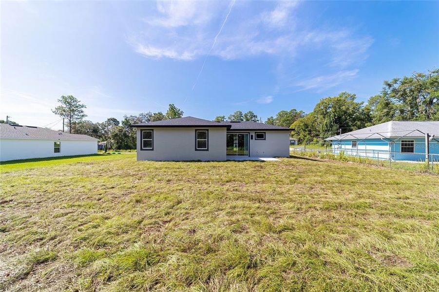 Front exterior of a new home in , Ocala, FL, highlighting curb appeal (Image 27).