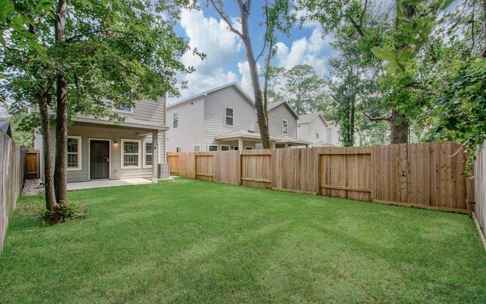 Amazing private backyard with covered patio! (photo from neighboring home)