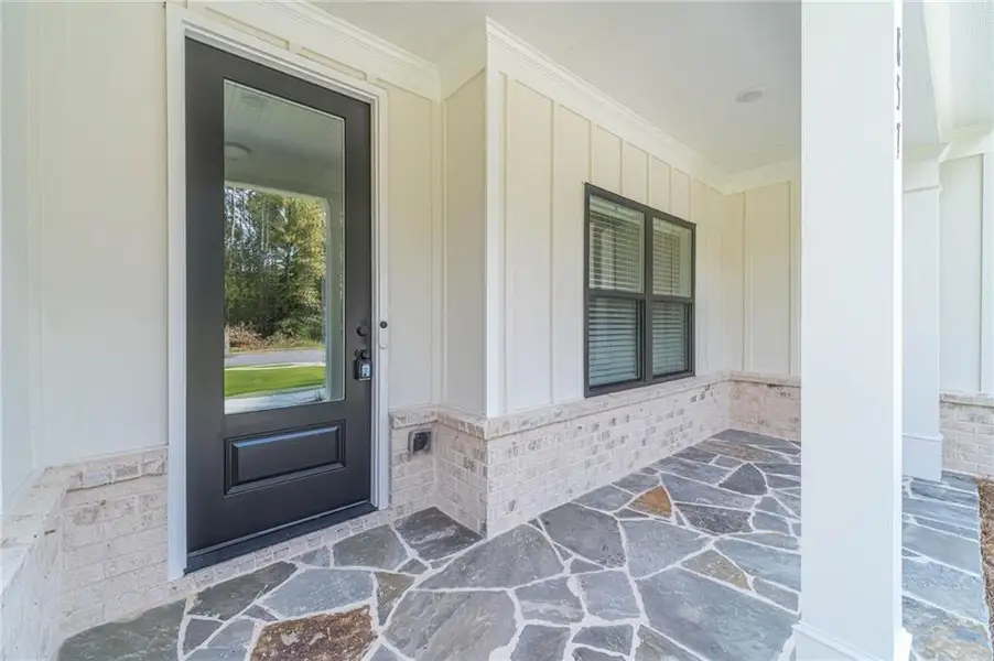 Exterior details and patio area of a home in , Loganville (Image 4).