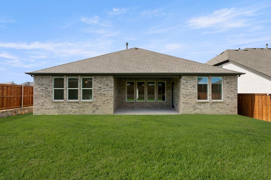 Exterior details and patio area of a home in Nelson Lake Estates, Rockwall (Image 21).
