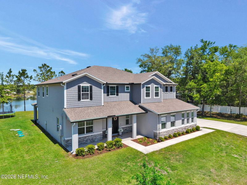 Front exterior of a new home in , Middleburg, FL, highlighting curb appeal (Image 29).