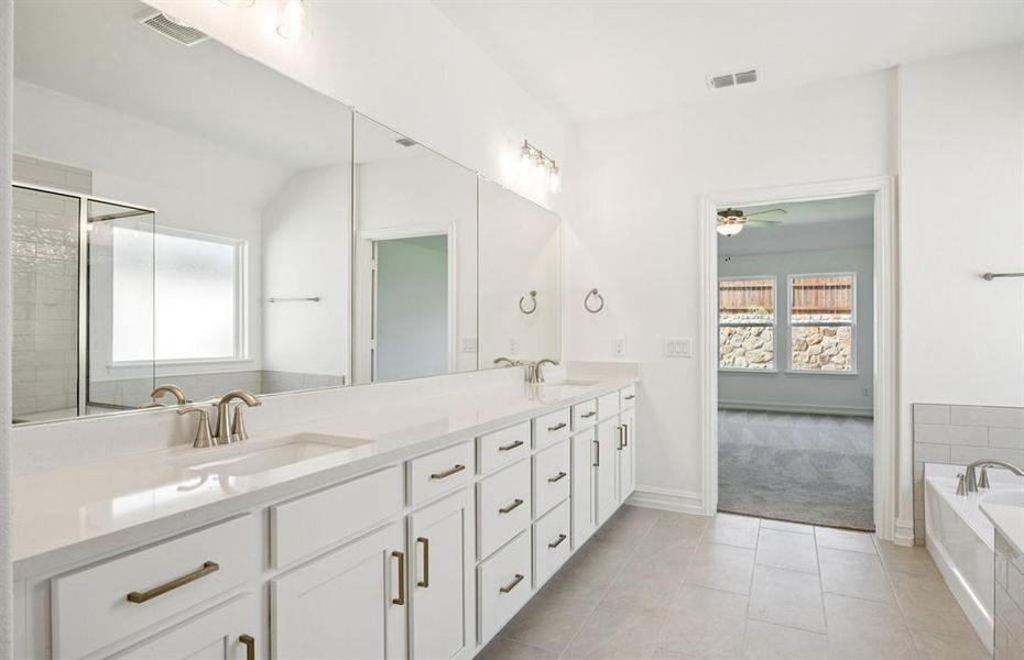 Owner's private bath with double vanity