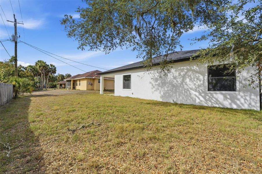 Exterior details and patio area of a home in , Port Charlotte (Image 3).