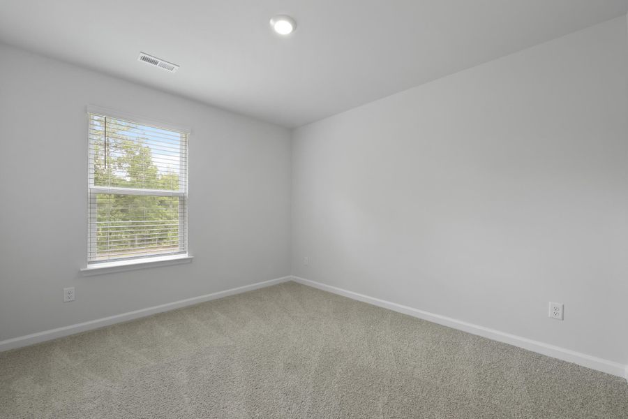 Spacious, unfurnished interior of a new home in Pineview North, Summerville (Image 30).