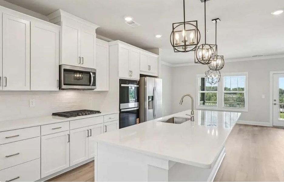 Furnished interior view inside a new home in , Cumming (Image 4). Furnished interior view inside a new home in , Cumming (Image 4).