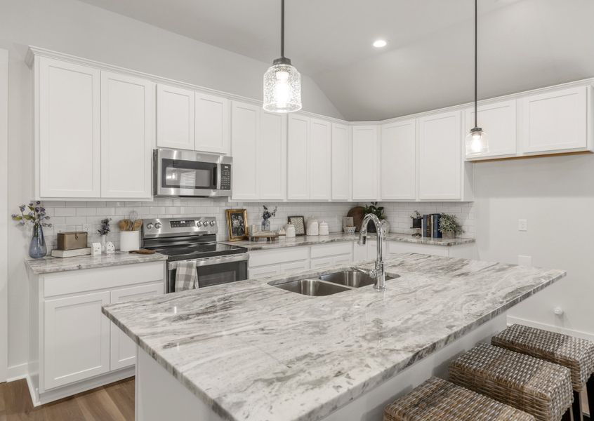 Representative furnished interior of a home built from the The Dahlia by Avonley Homes in Pinemont, Bryan (Image 6).