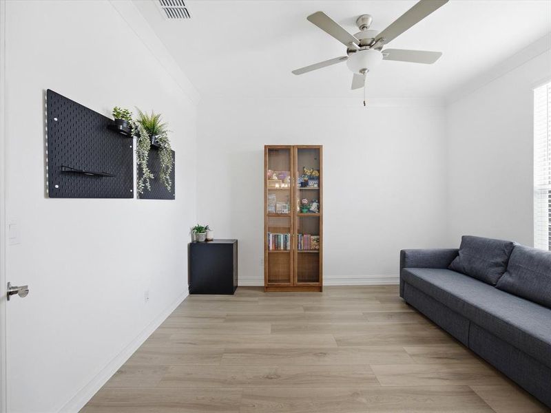 Office view of single story three bedroom home with an office and a formal dining room