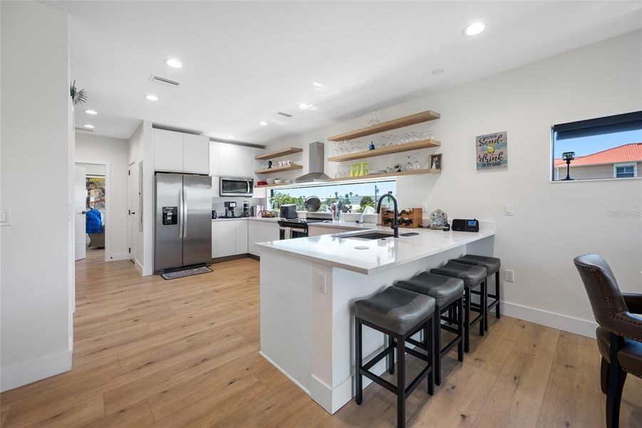 Furnished interior view inside a new home in , Indian Rocks Beach (Image 11).