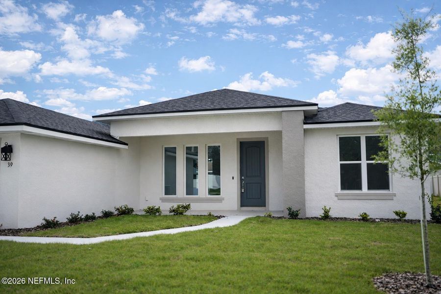 Exterior details and patio area of a home in , Palm Coast (Image 24).